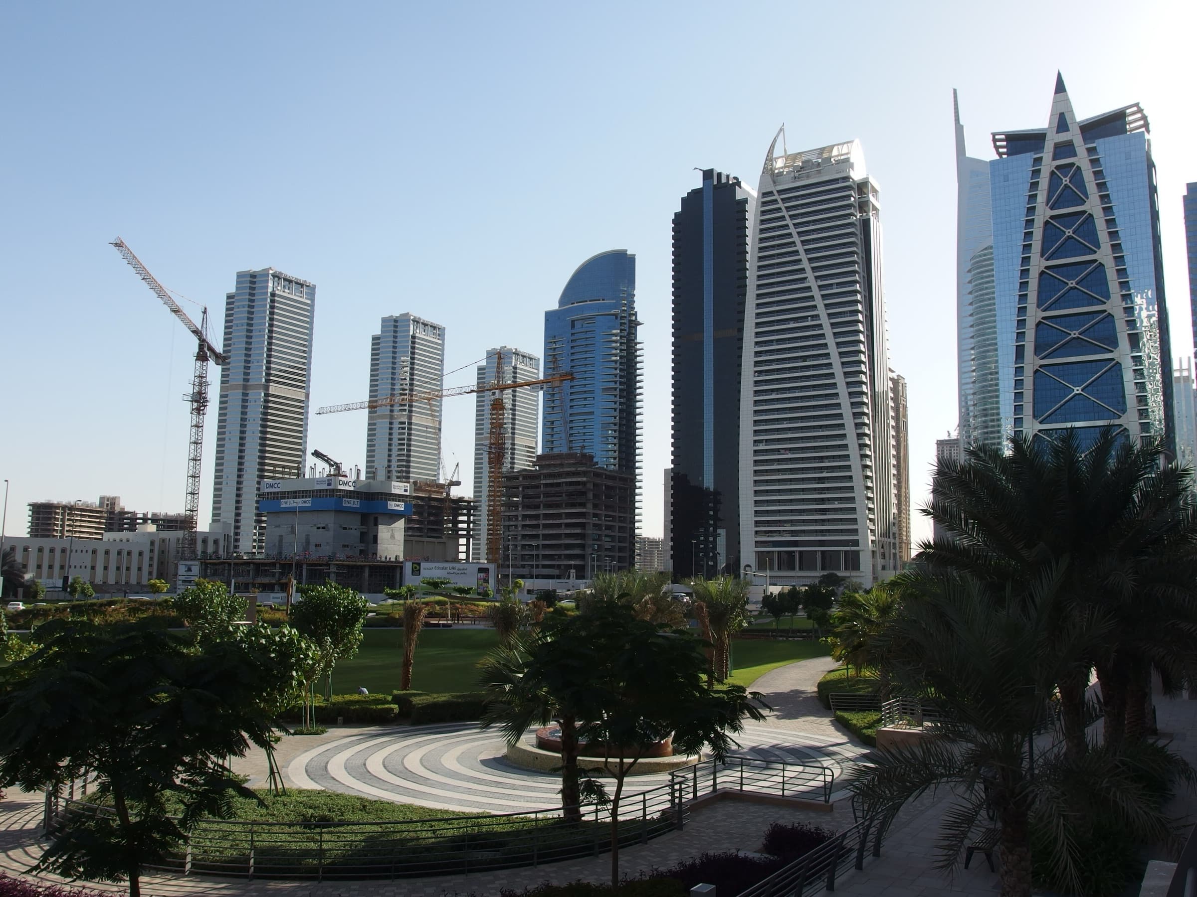 Towers and landscaped park in Jumeirah Lake Towers, Dubai